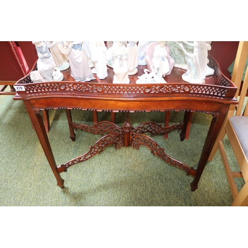 479 - Good quality Mahogany Silver table with galleried top over pierced cruciform base