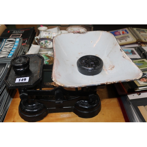 149 - Cast Iron 14lb weighing scales with enamel pan and assorted weights