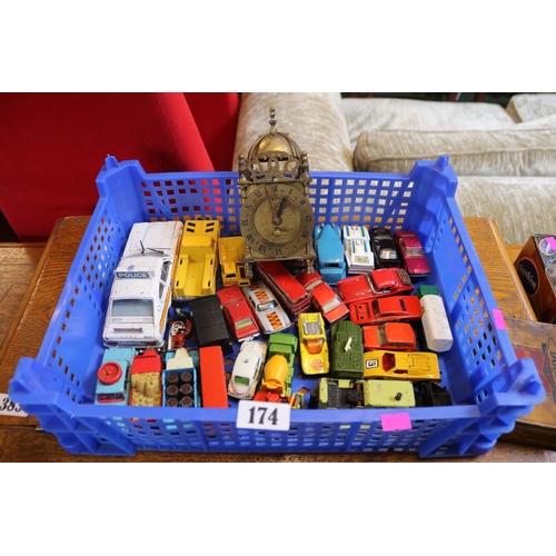 174 - Collection of Toy Vehicles and a Brass British Skeleton clock