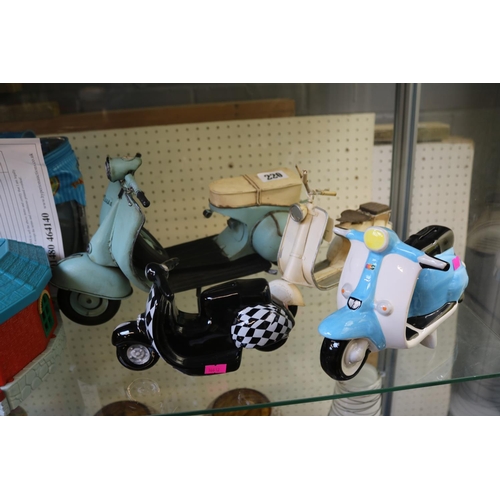 220 - collection of 4 Model Vespa Mopeds