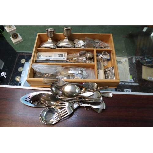 273 - Tray of assorted Silver plated Flatware, Pair of White metal squat candlesticks, Propelling Pencil, ... 