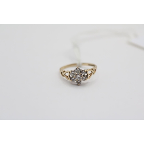 301 - Ladies 9ct Gold CZ set cluster ring Size N. 1.5g total weight