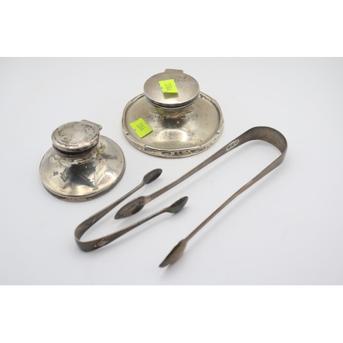 351 - 2 Silver Capstan Inkwells and 2 Silver Sugar tongs (43g)