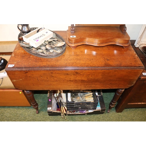 374 - 19thC Mahogany drop leaf table with turned supports and caster feet