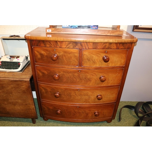 377 - Victorian Mahogany bow fronted chest of 2 over 3 drawers with turned handles supported on bun feet