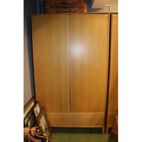 391 - Ercol Rimini Double wardrobe with single drawer to base