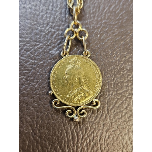 328 - 1889 Gold Sovereign in 9ct Gold mount on a Yellow metal chain 22g total weight