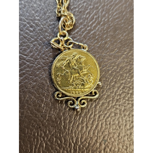 328 - 1889 Gold Sovereign in 9ct Gold mount on a Yellow metal chain 22g total weight