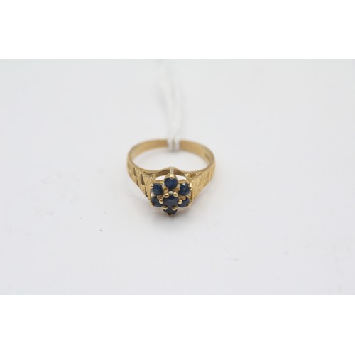 300B - 18ct gold and sapphire cluster ring with machined sides 3.06g