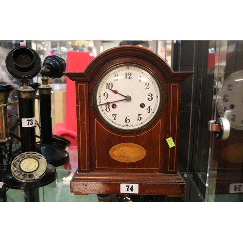 74 - Edwardian domed top Mantel clock with numeral dial and inlaid shell motif with key