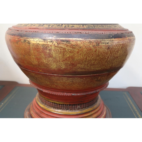 106 - A Large Southeast Asian Red Lacquer and gilt decorated box with cover. 84cm in Height