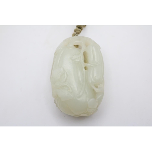 146 - Fine Antique Chinese Celadon Jade Oval Gourd Pendant Charm with carved Foliage mounted on braided st... 