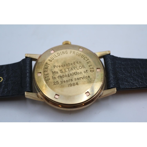 185 - Garrards 17 Jewel 9ct Gents wristwatch with engraved reverse 34mm case within original case