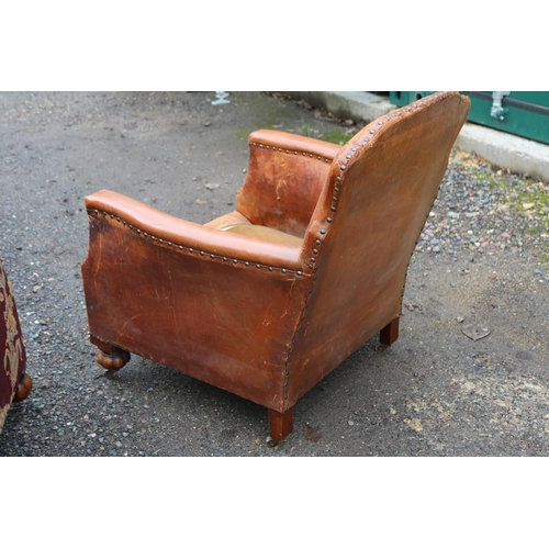 194 - Pair of French Arts & Crafts Leather Saloon club chairs with embossed floral & Butterfly motifs to b... 