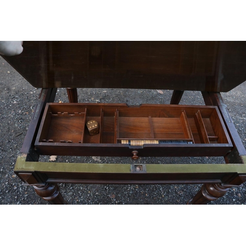 214 - Fine Edwardian Games table with cantilever base fitted interior with screw in candlesticks, money an... 