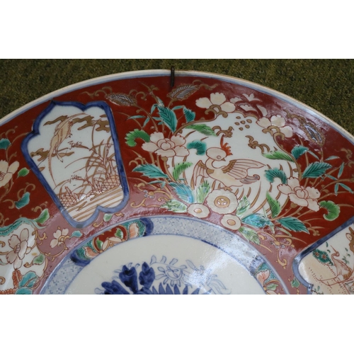 46 - Large Late 19thC Imari Charger with central blue and white decoration with Prunus and bird panels, m... 