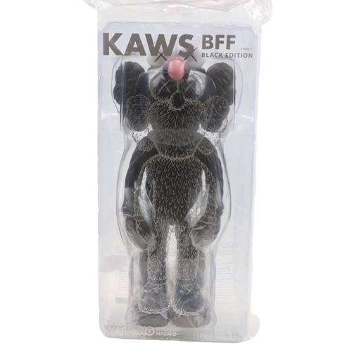 127 - Kaws BFF Black edition born by Brian Donnelly in sealed plastic merchandising bag and Hologram37cm i... 