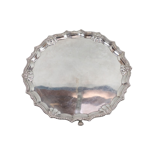 139 - Good quality Silver salver with rope edge supported on Paw pad feet, Birmingham 1974. 860g total wei... 