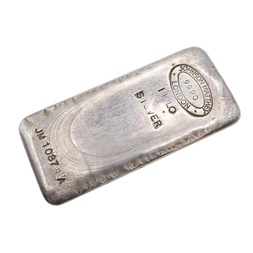 140 - 1 Kilo Johnson Matthey of London Silver Bar JM 10879A. 11.5cm in Length