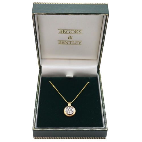 151 - Boxed Brooks & Bentley 9ct Gold Diamond Set Pendant. Seven Brilliant Cut Diamonds in Milligrain with... 