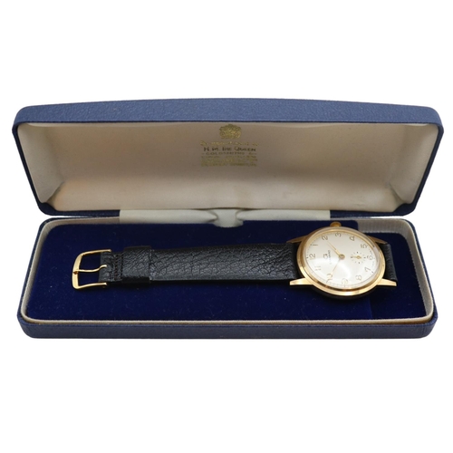 185 - Garrards 17 Jewel 9ct Gents wristwatch with engraved reverse 34mm case within original case