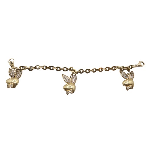 167 - 9ct Gold Playboy Design Charm bracelet 15g total weight