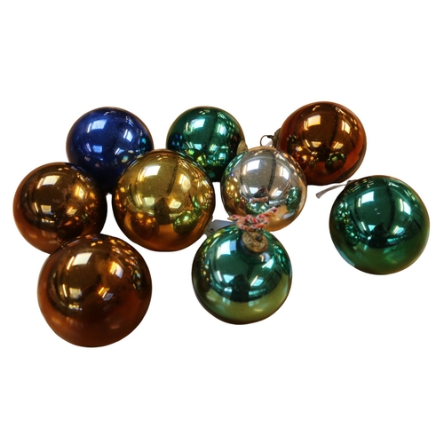 107 - Witches' balls, Victorian 19th century, a collection of Nine Victorian coloured-glass spheres, on a ... 