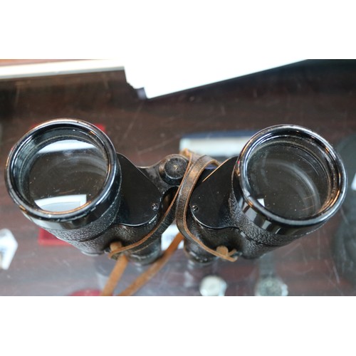 83 - WW2 German Dienstglas 7 x 50 Binoculars in fitted leather case. Dated 1944 with eagle markings. Clea... 