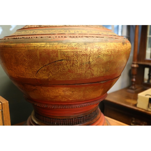 131 - A Large Southeast Asian Red Lacquer and gilt decorated box with cover. 84cm in Height