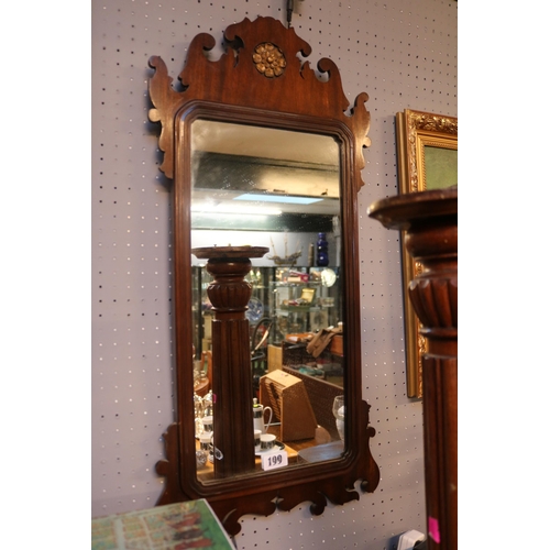 199 - Framed Georgian Mahogany scroll decorated mirror with gilded floral roundel