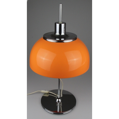 Original Harvey Guzzini Faro Orange Space Age 1970s Table Lamp. Faro table lamp by Harvey Guzzini. This is an early version likely from the production period of 1970 - 1972.
The lampshade is mushroom-shaped and designed in two parts. Above the orange acrylic shade protrudes a chrome-colored metal hood. The shade sits on a chrome shaft that transitions into a heavy plate base at the bottom. The lampshade can be adjusted in height at the stem, which gives the lamp a changing appearance and lighting effect.
Light wear consistent with age and use and patina consistent with age and use.
It works perfectly and has both bakelite bulb fittings.
The rise and fall movement works smoothly, and gives you a range of light effects.
It has lost its original makers sticker. 
The switch which works very smoothly, and is fitted with a UK plug.
Height 61 cm
Diameter 33 cm