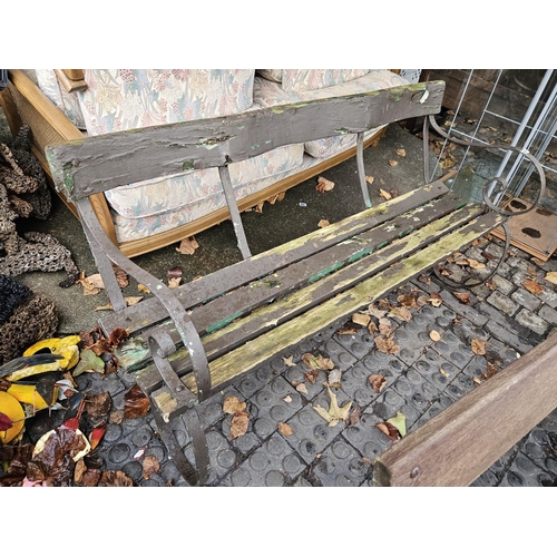 446 - Wrought metal clatted garden bench