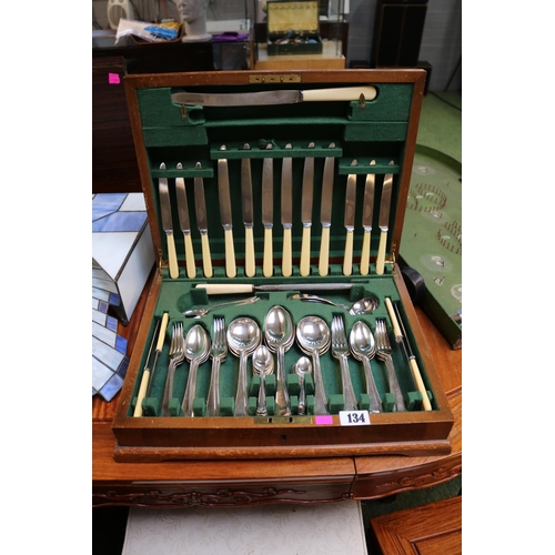 134 - Bruford & Sons of Eastbourne and Exeter Walnut cased canteen of Cutlery