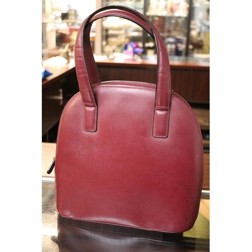 61 - Vintage 1980s Cartier Burgundy satchel type handbag with brass fittings 26cm in Width