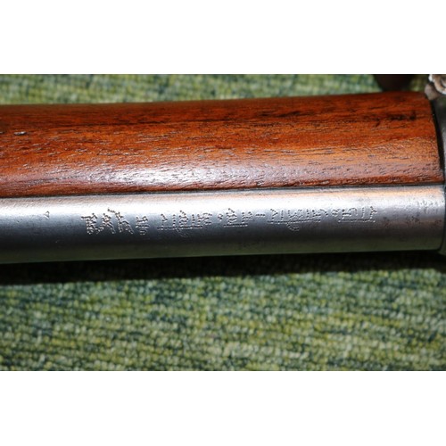 285 - 19thC Indian Carbine on walnut stock with brass and steel fittings and fabric strap. 84cm in Length ... 