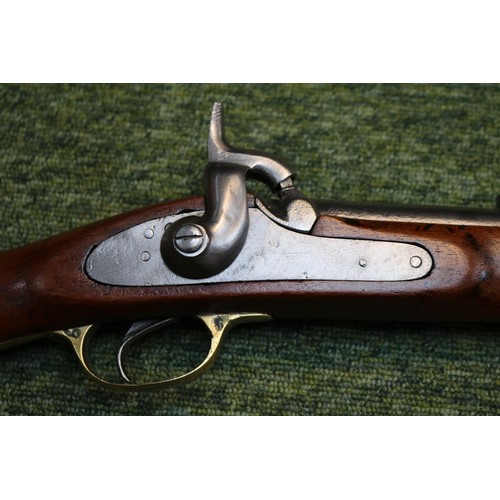 285 - 19thC Indian Carbine on walnut stock with brass and steel fittings and fabric strap. 84cm in Length ... 