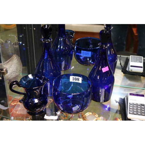 108 - 2 Antique Bristol Blue Decanters with flattened knops, cream jug and a sugar bowl