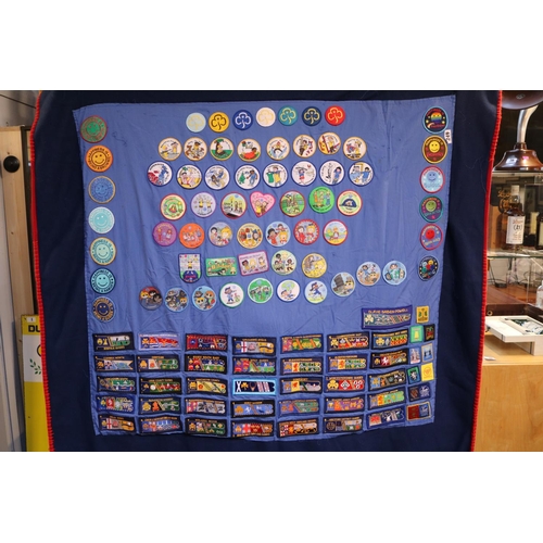 249 - Girl Guides Blankets and Ponchos with assorted Badges