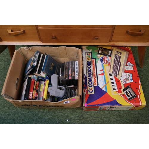 319 - Boxed Commodore 64 and a collection of assorted boxed computer Games