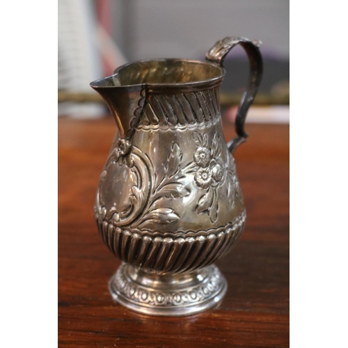 334 - Silver Cream Jug with Foliate embossed decoration London 1901 150g total weight