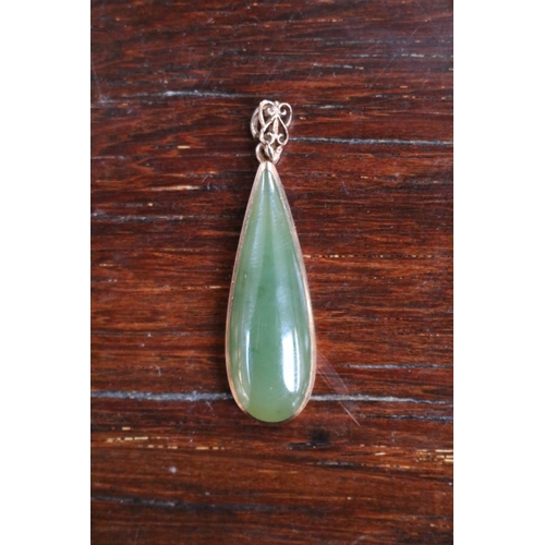 350 - 1970s Jade rub over tear drop design 9ct gold pendant 6.4g total weight