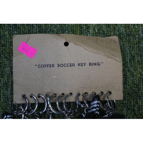 64 - Collection of Retailers Football boot keyrings in the style of adidas marked Coffer Soccer Key Ring ... 