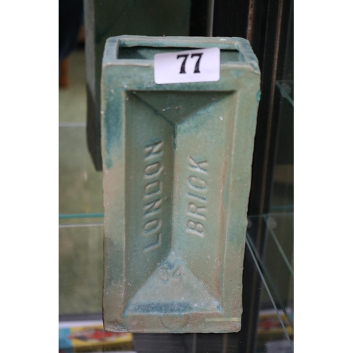 77 - Turquoise model of a London Brick stamped 34 20cm in Height