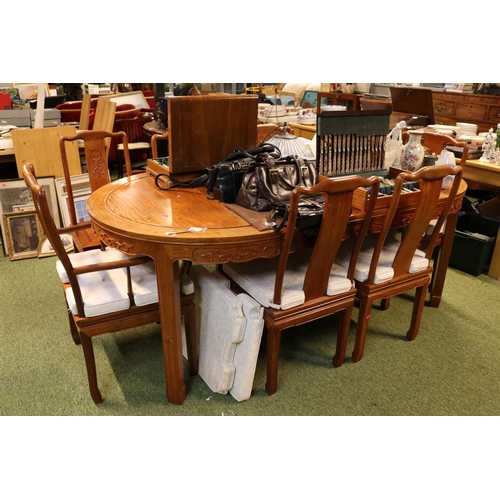 407 - 20thC Chinese Hardwood Oval dining table with 2 leaves and a set of 6 dining chairs