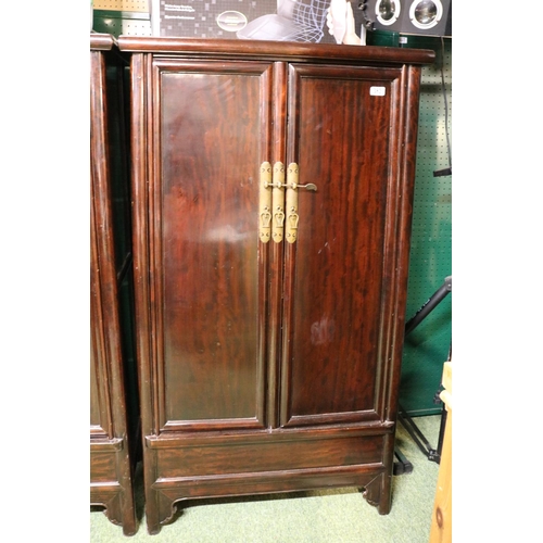 474 - Chinese Hardwood 2 door cabinet with drawer base and brass fittings