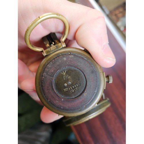 323 - 1917 Military Field Compass and a Heavy Brass Trench Art WWI Lidded Tobacco cannister