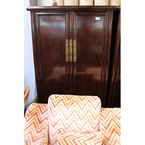 475 - Chinese Hardwood 2 door cabinet with drawer base and brass fittings