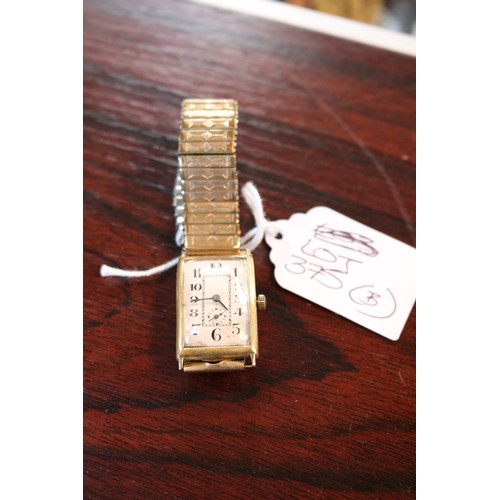 375b - Gents 18ct Gold  Rectangular faced wind up watch with expanding gilt bracelet