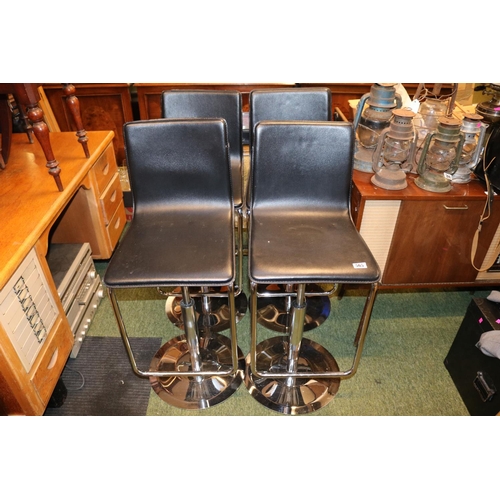 565 - Set of 4 Chrome adjustable Leatherette seated bar Stools