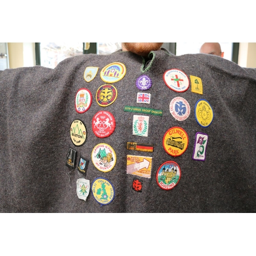 140 - Scouting Poncho with assorted Badges and Embroidered emblems